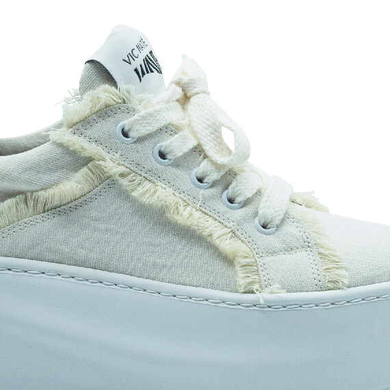 Wave  fringes ecrù shoe 